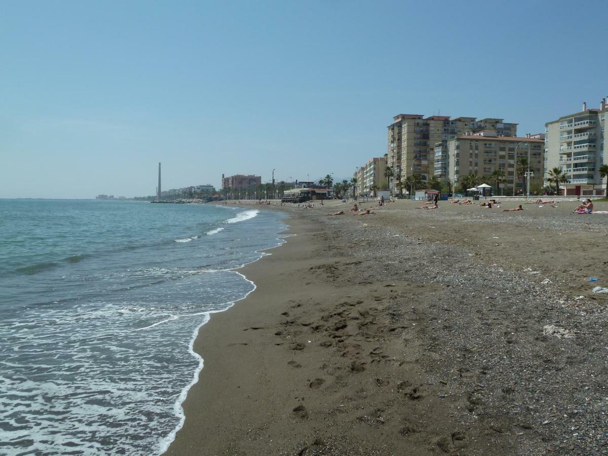 à * Málaga